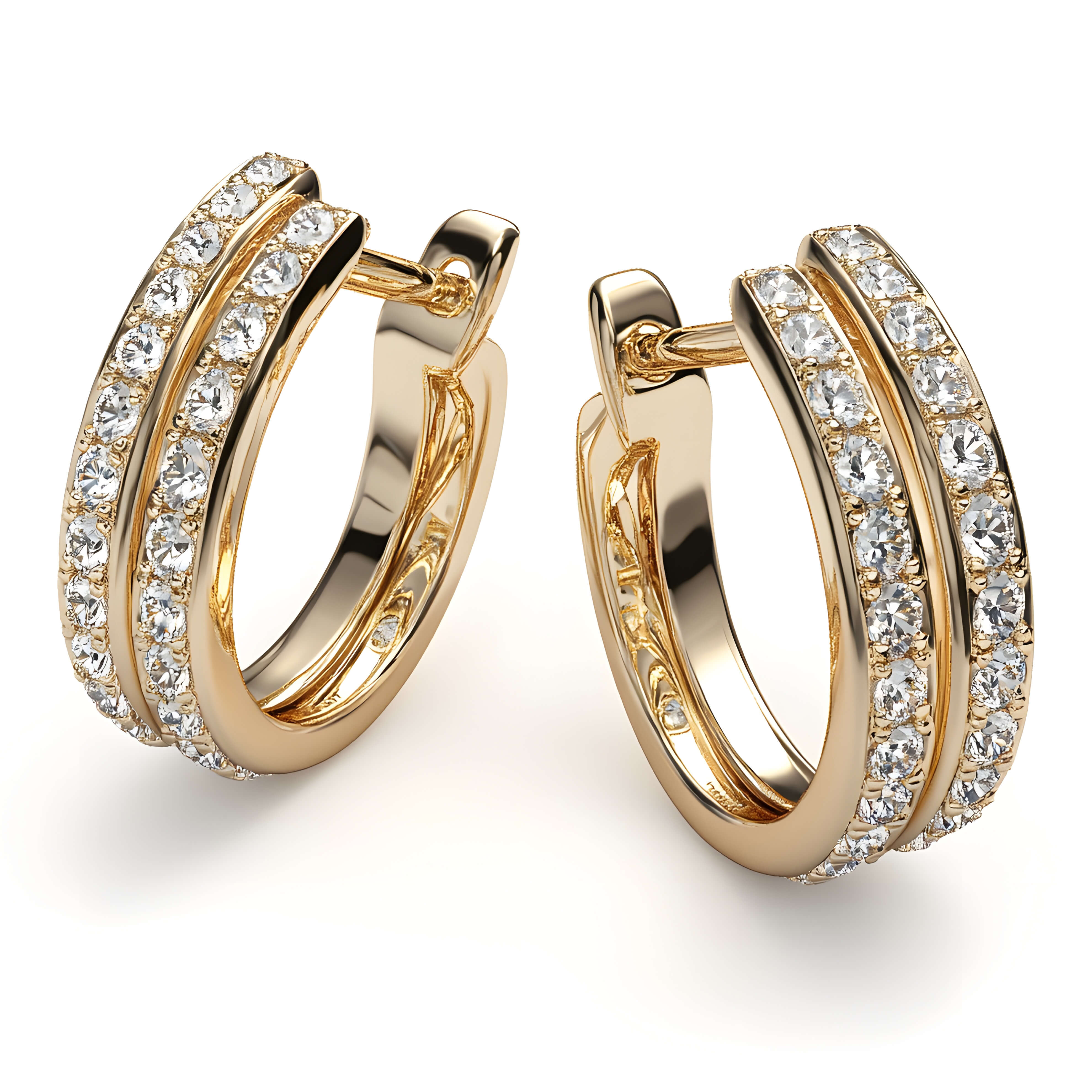 goldene-creolen-mit-eingesetzten-diamanten-auf-weißem-hintergrund